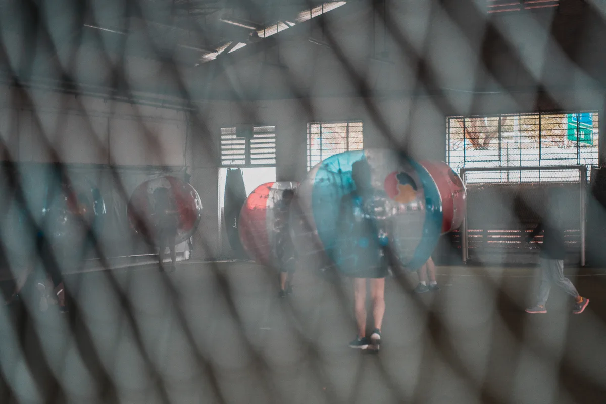 Bubble Soccer players gathered inside the suits during an active hosted session