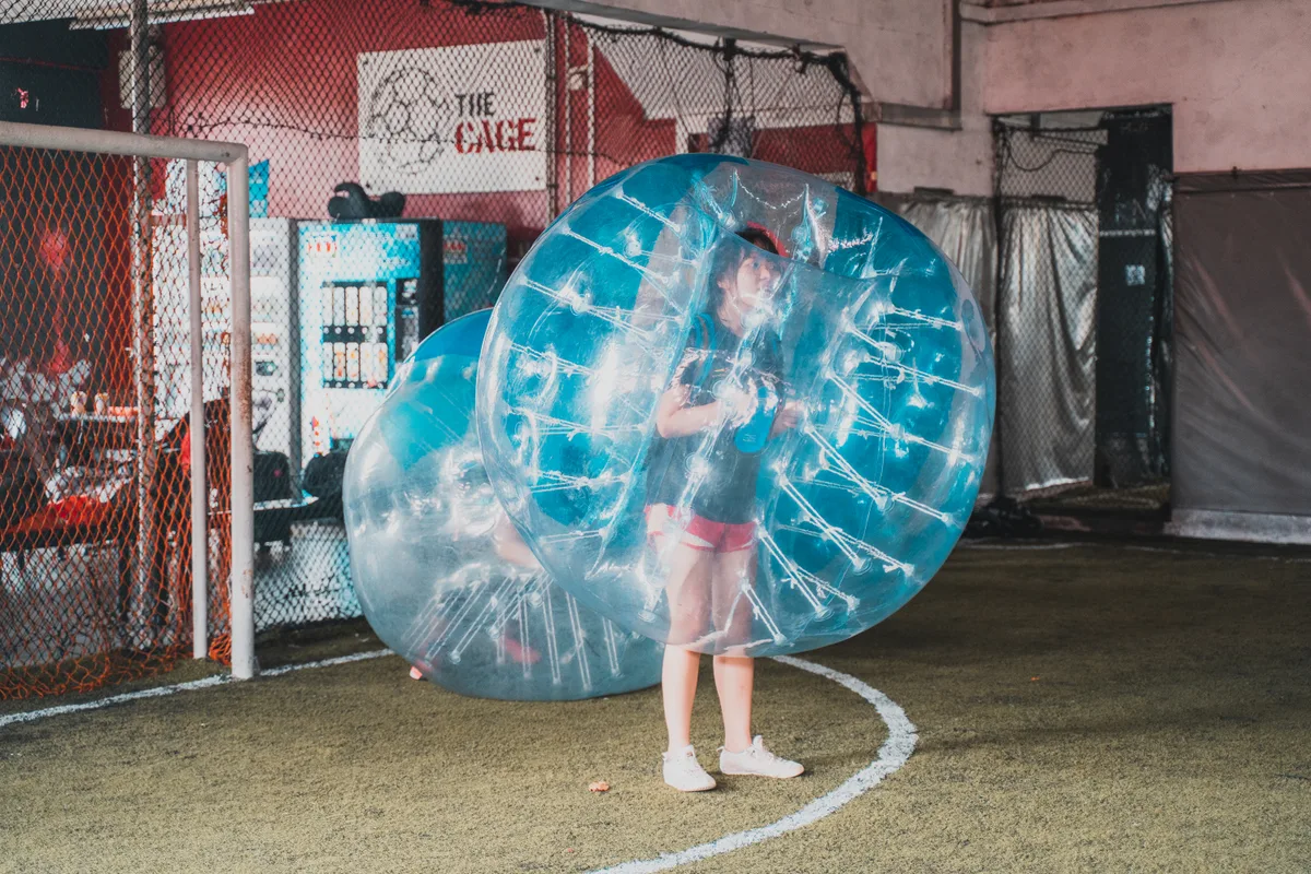 Bubble Soccer player standing ready near goal before the next lively round