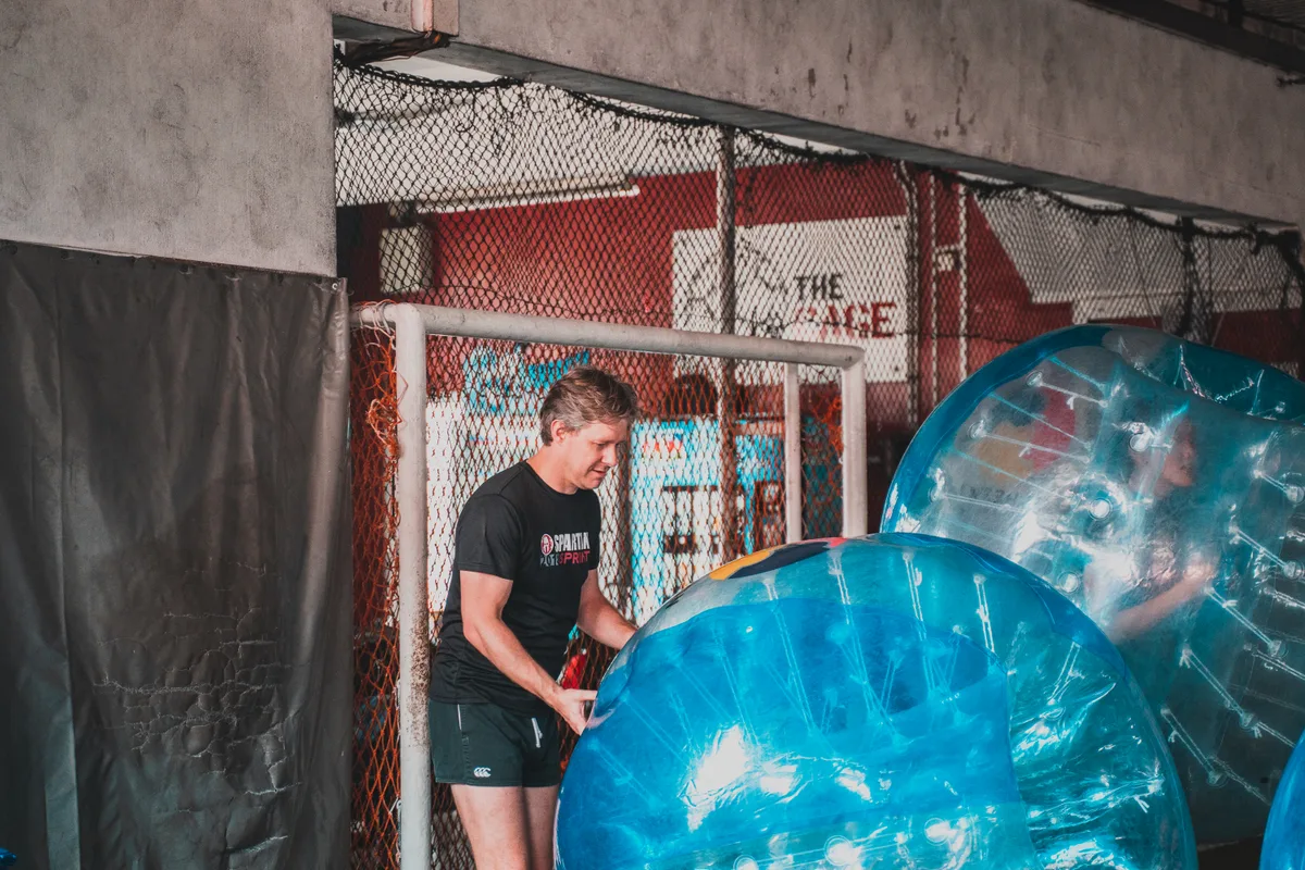 Bubble Soccer setup near the goal at the indoor venue