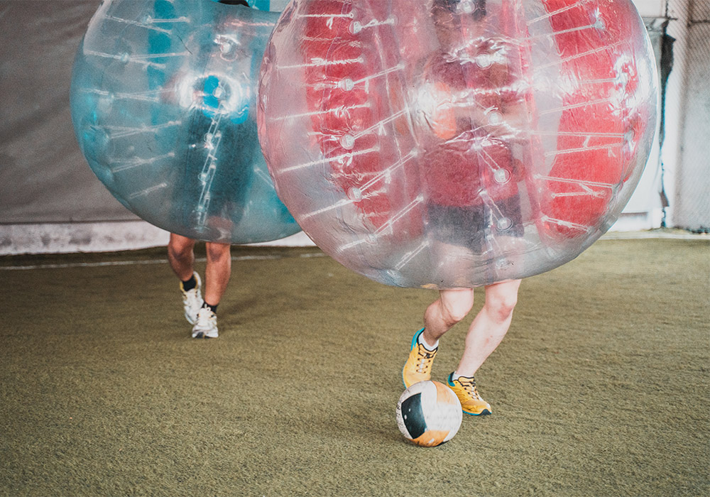 Bubble Soccer final invasion round with multiple players